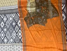  шарф Hermès Selle des Steppes оранжево-коричневого цвета с бахромой. 