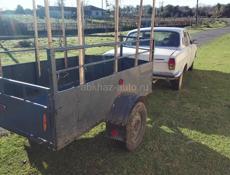 Машина с прицепом.