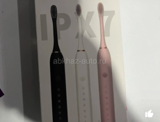 Электрическая зубная щетка