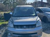 Тойота Вокси 2.0