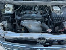 Тойота Вокси 2.0