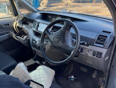 Тойота Вокси 2.0