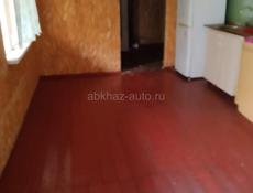 Участок на Бзыби с фруктовым садом и строением