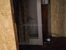 Участок на Бзыби с фруктовым садом и строением