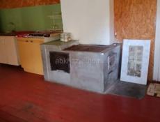 Участок на Бзыби с фруктовым садом и строением