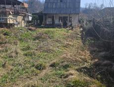 Продаётся дом с участком 7 соток земли полный пакет документов Ачадара . Рассмотрю обмен на квартиру 2-х комнатная на новом районе