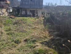 Продаётся дом с участком 7 соток земли полный пакет документов Ачадара . Рассмотрю обмен на квартиру 2-х комнатная на новом районе