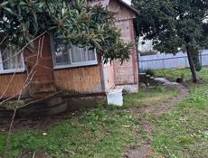 Земельный участок с домом (деревянным)