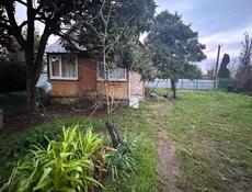 Земельный участок с домом (деревянным)