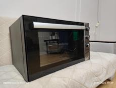 Продам новую духовку 