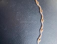 Продам золотое кольцо и браслет