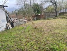 в районе чанба 10 соток срочно или обмен на равностоющию машину  