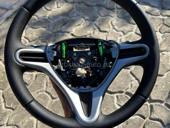 Перетяжка руля и элементов салона 
