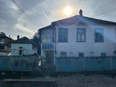 Дом с участком в центре города 