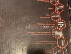 Перфоратор-дрель Вихрь в своей коробке 