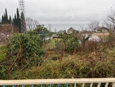 участок по объездной в Гагре,рядом Армянская церковь