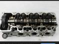 Головки мерседес 2,4л 2 штуки с распредвалами 