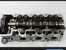 Головки мерседес 2,4л 2 штуки с распредвалами 