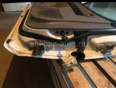 Двери на мазда демио 