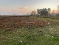 Продаю земельны участок в Киндги по центральной трассы 