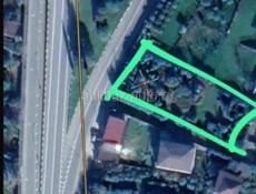 Срочно продается земельный участок по центральной трассе 15 соток. Обмен не интересует!