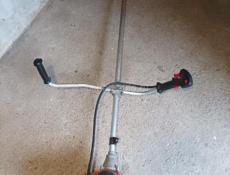 Бензокосилка в хорошем состоянии