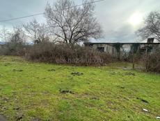 Продаю участок,строился магазин,6 соток земли,прям по трассе Очамчирский район с Акуаска, цена из-за срочности Документы на руках очень срочно без торга