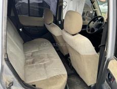 Мицубиси Паджеро io 2.0