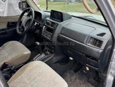 Мицубиси Паджеро io 2.0