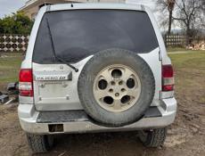 Мицубиси Паджеро io 2.0