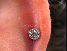 Прокол ушей 