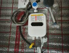 Водонагреватель проточный.