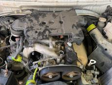 Мицубиси Паджеро io 2.0 