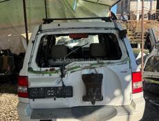 Мицубиси Паджеро io 2.0 