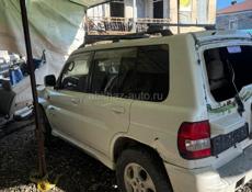 Мицубиси Паджеро io 2.0 