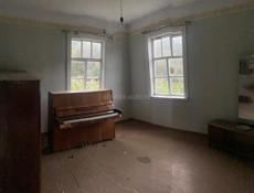 ДОМ ТКУАРЧАЛ 