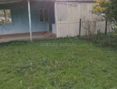 Дом с земельным участком  на Бзыби 