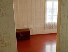 Дом с земельным участком  на Бзыби 