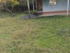 Дом с земельным участком  на Бзыби 