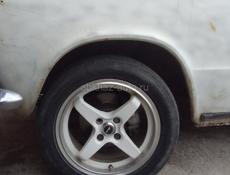 Диски с покрышками р 15