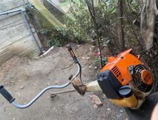 Б/у косилка в оригинале всё, работает отлично цена 55.000 тысяч!