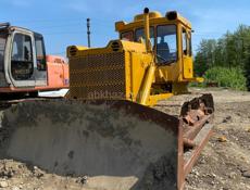 Услуги экскаватора, бульдозера и трала.