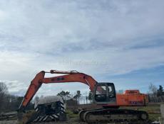 Услуги экскаватора, бульдозера и трала.