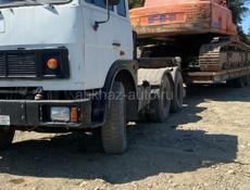 Услуги экскаватора, бульдозера и трала.