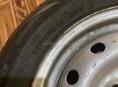 Покрышка новая с диском 