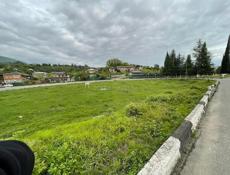 Обменяю участок земли ,на квартиру в Гагре.