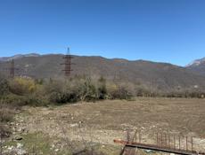 Продажа большого земельного участка по центральной дороге на Бзыби 