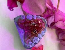 Зубной техник