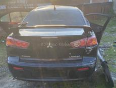 В разборе Mitsubishi Lancer 2.0