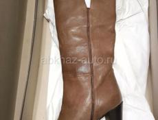 Новые кожаные сапоги 